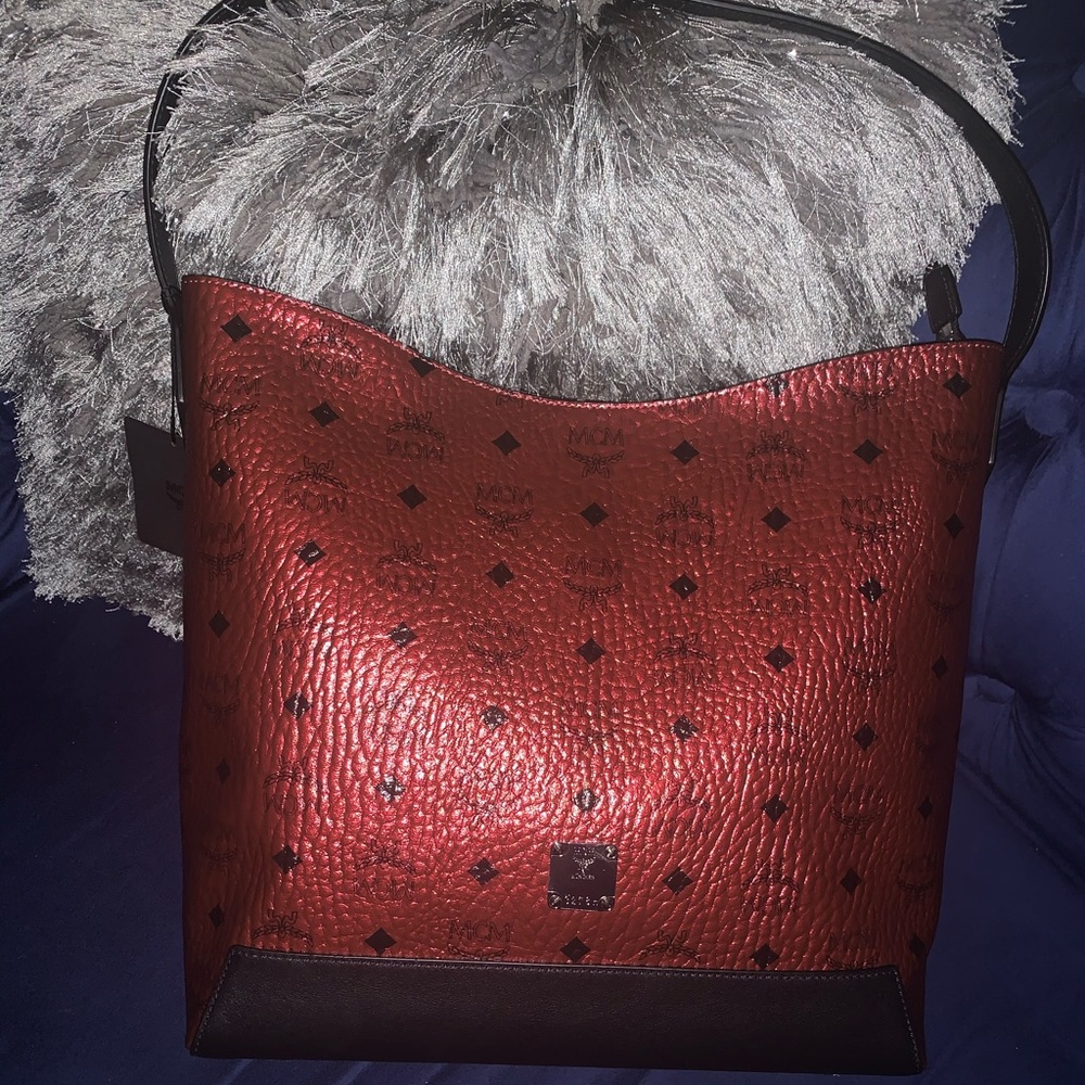 Authentic MCM Bag with Tags and duster bag